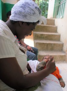 Woman nursing infant